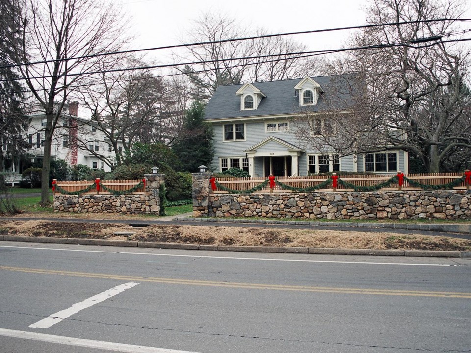 Fieldstone Wall with custom fence