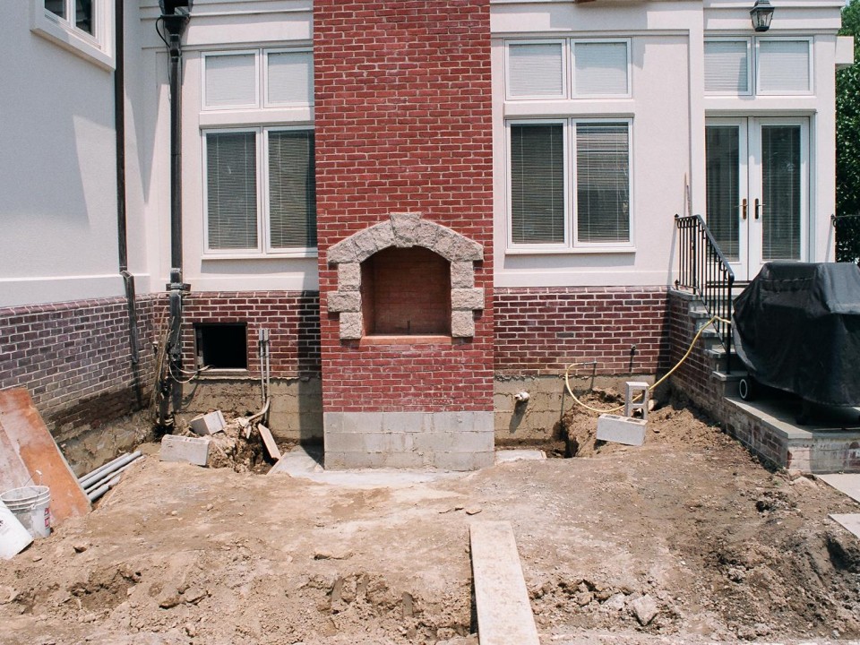 Outdoor fireplace during construction phase