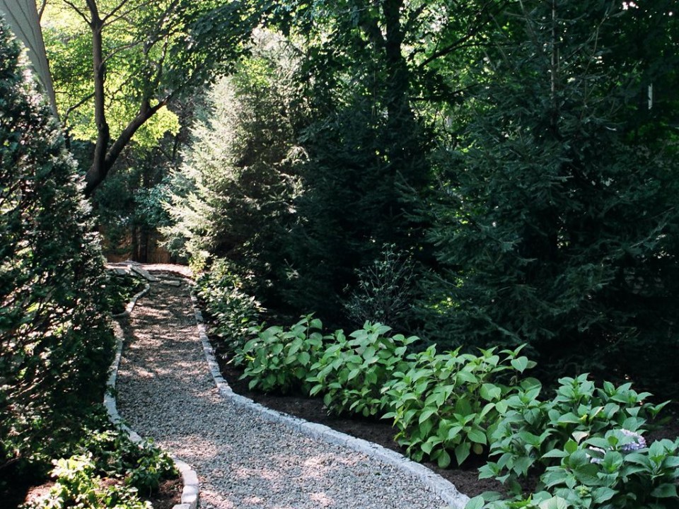 Gravel walkway with Belgian block border