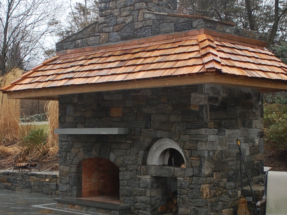 Stone fireplace with pizza oven