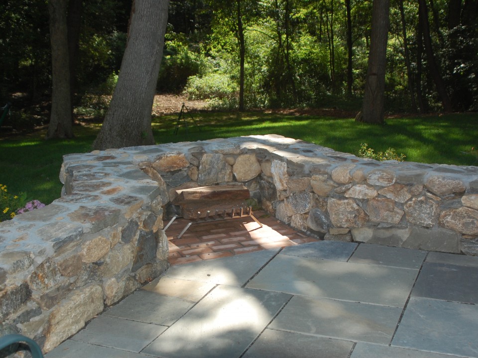 Stone wall with fireplace niche