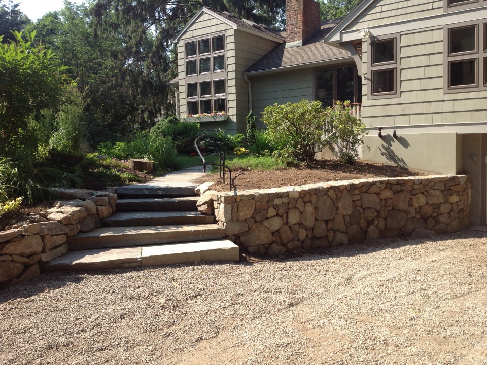 Fieldstone wall with stone steps